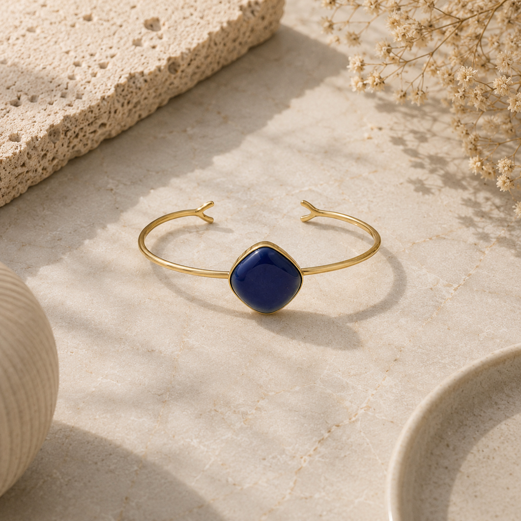 ANUVA Gold Tone Open Cuff Bracelet with Blue Ceramic Stone