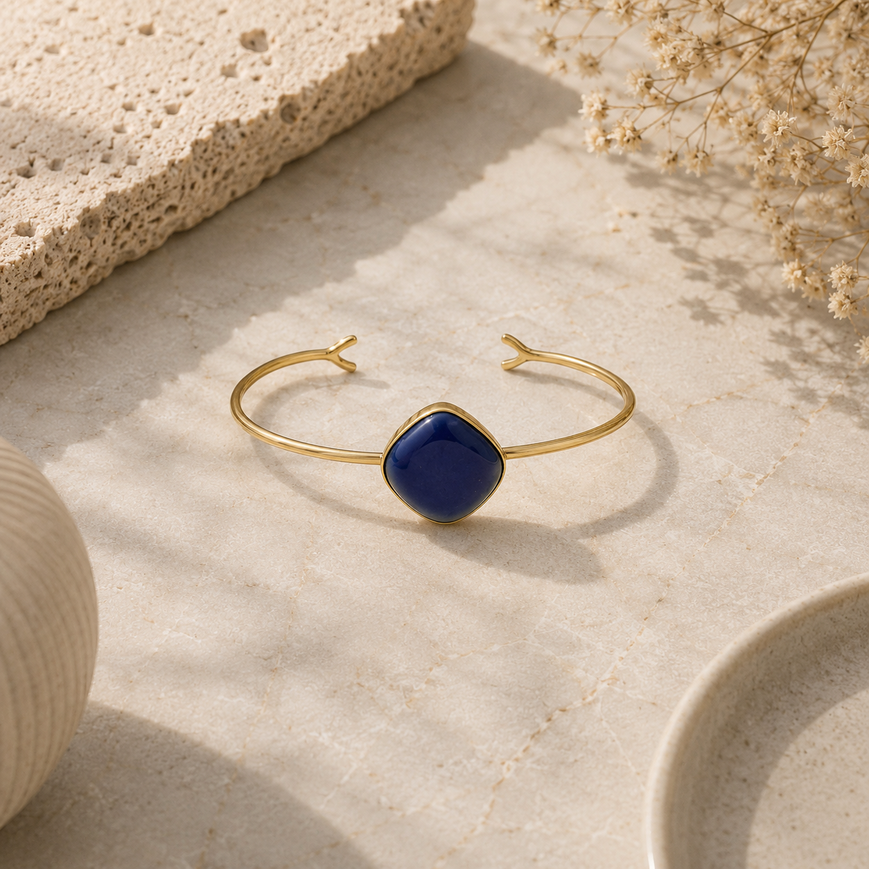 ANUVA Gold Tone Open Cuff Bracelet with Blue Ceramic Stone