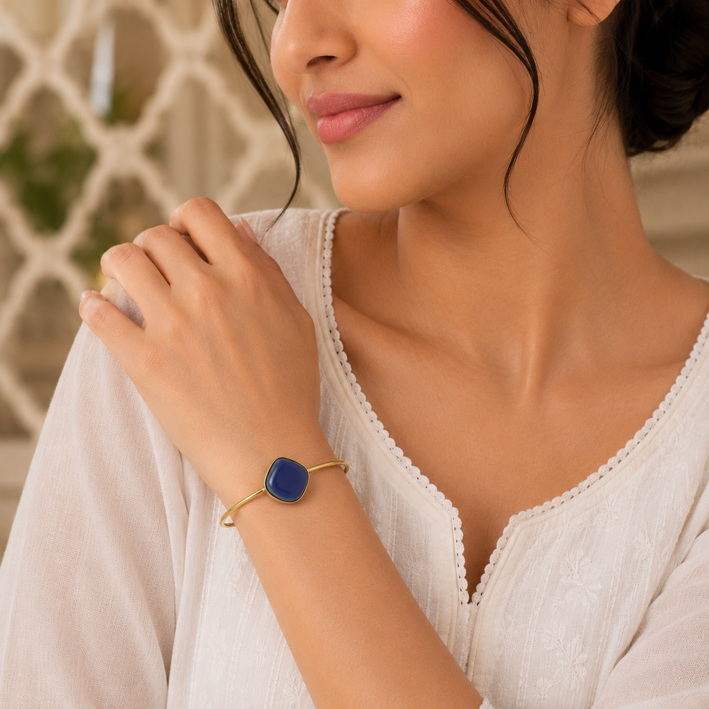 ANUVA Gold Tone Open Cuff Bracelet with Blue Ceramic Stone