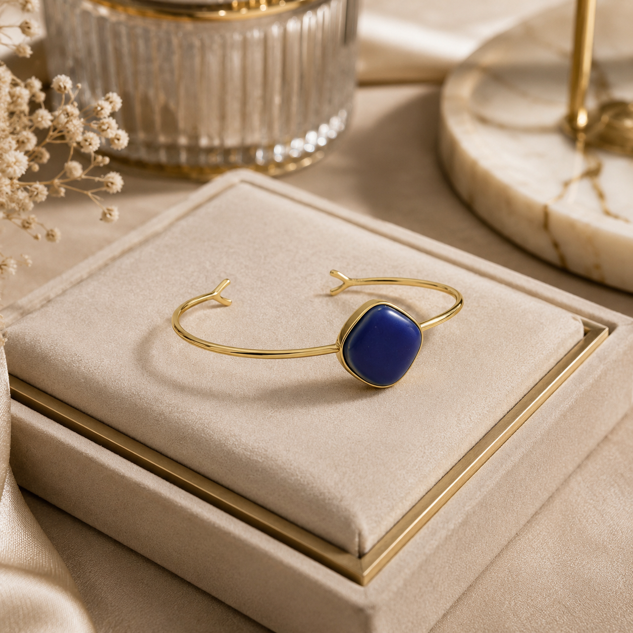 ANUVA Gold Tone Open Cuff Bracelet with Blue Ceramic Stone