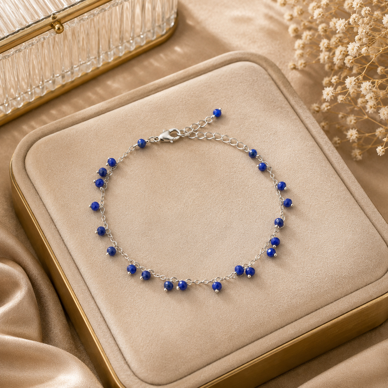 ANUVA Silver Tone Chain Bracelet with Blue Crystal Accents